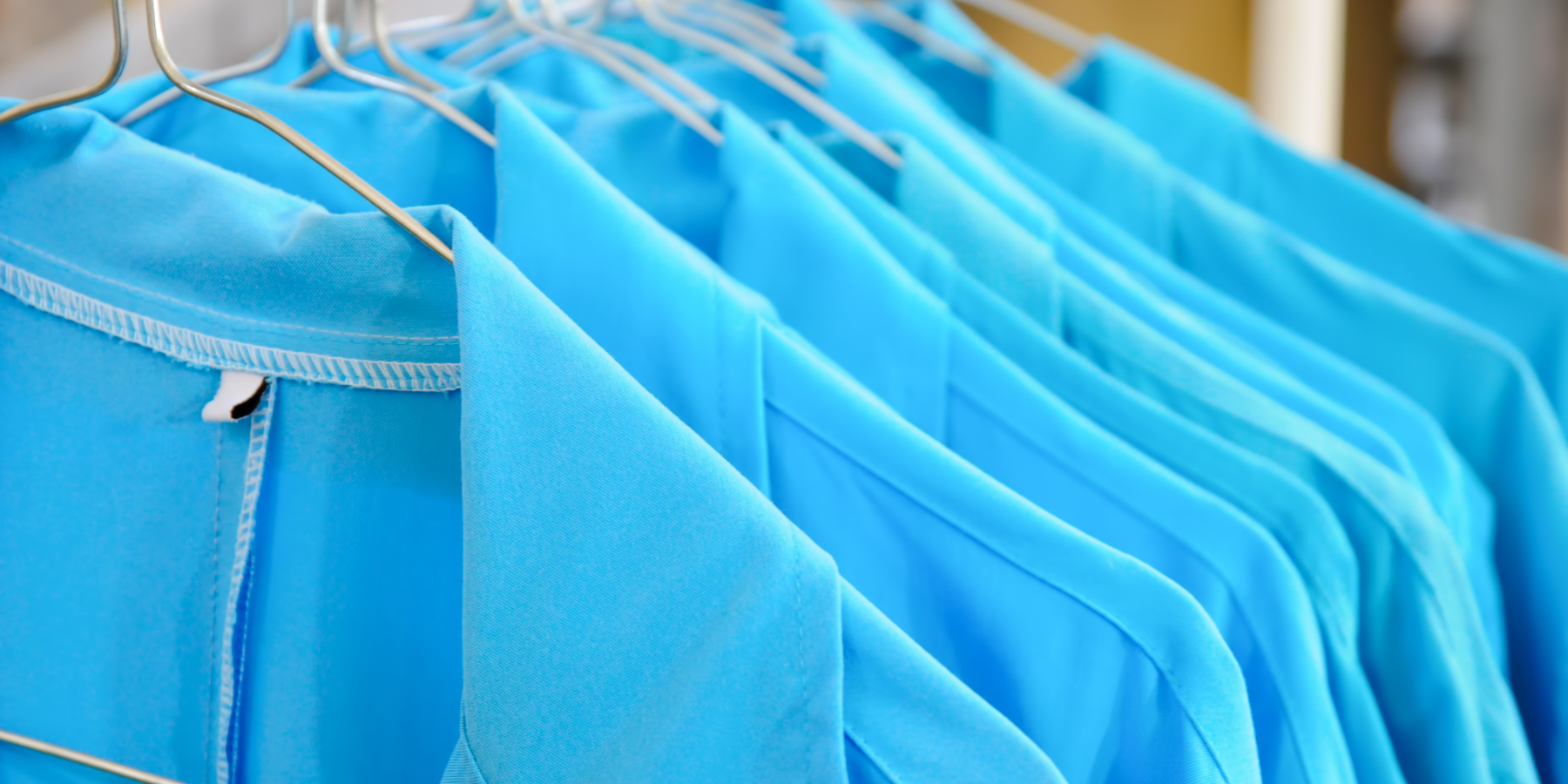 Blue Uniforms On Hangers 1800X900